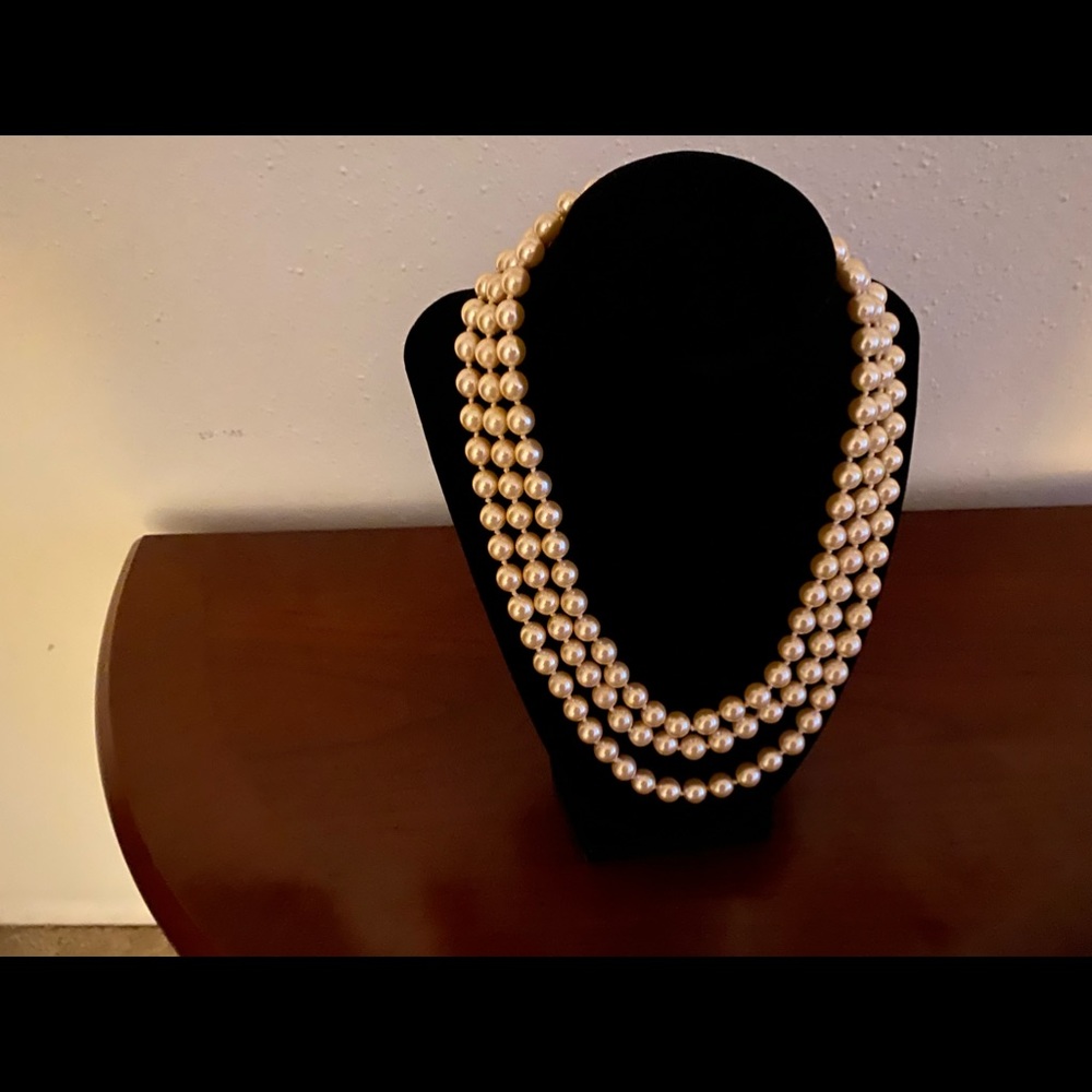 Three row elegant white pearls
